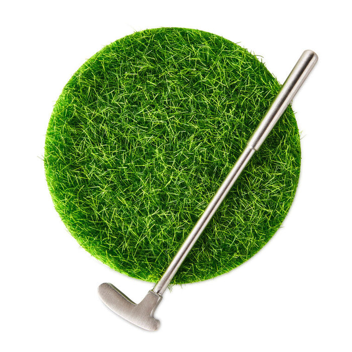 Golf club on a green grassy patch with a white background