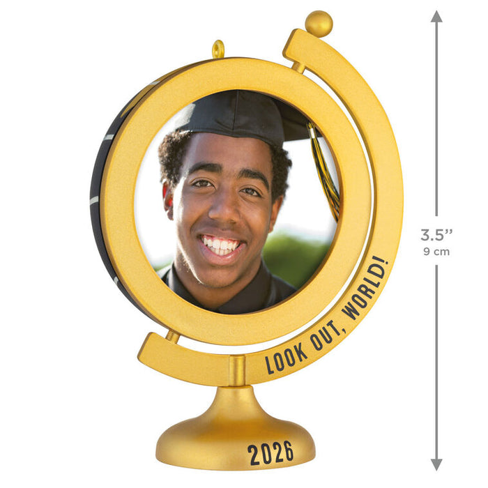 Gold globe-shaped photo frame with a person in a graduation cap and 'Look Out, World! 2026' text.