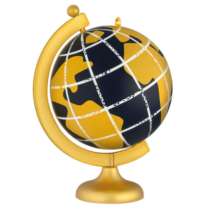 Globe with gold stand on a white background