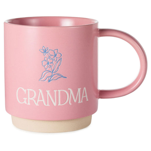 Pink mug with 'GRANDMA' and floral design on a white background