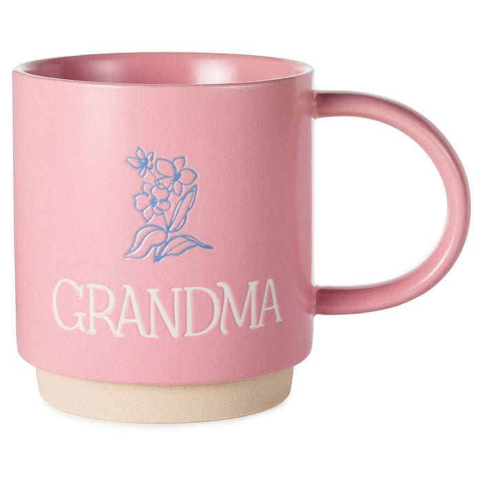 Pink mug with 'GRANDMA' and floral design on a white background