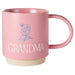 Pink mug with 'GRANDMA' and floral design on a white background