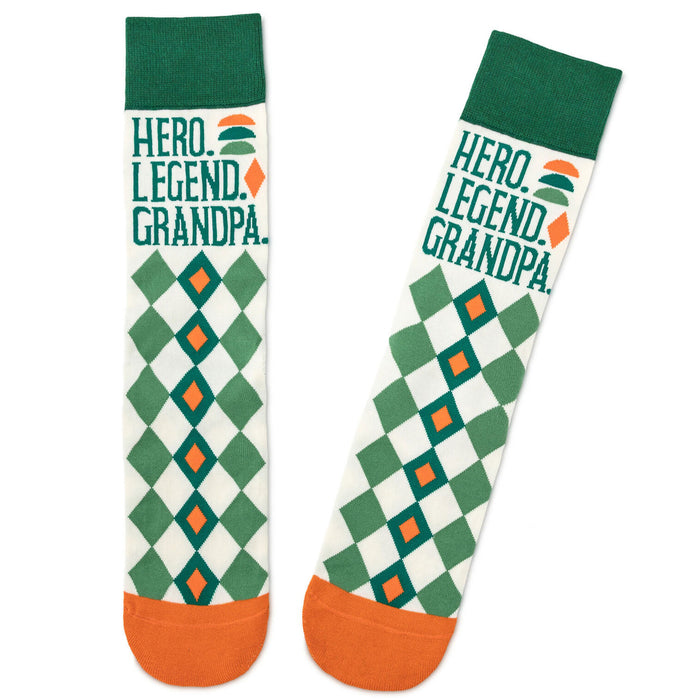 Green and orange socks with 'Hero. Legend. Grandpa.' text on a white background