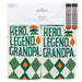 Pair of socks with 'Hero. Legend. Grandpa.' text and geometric patterns, displayed in packaging with Hallmark branding.