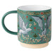 A ceramic mug with a teal green body, featuring a detailed illustration of a white griffin and a gray dragon amidst gold foliage and red roses on a teal background. The mug has a solid teal green handle, a white interior, and a natural beige clay foot.