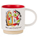 A white ceramic mug with a red interior and a beige base, featuring a Grinch-themed illustration of the Grinch looking at his reflection in a mirror with the text 'What a great Grinchy trick!'.