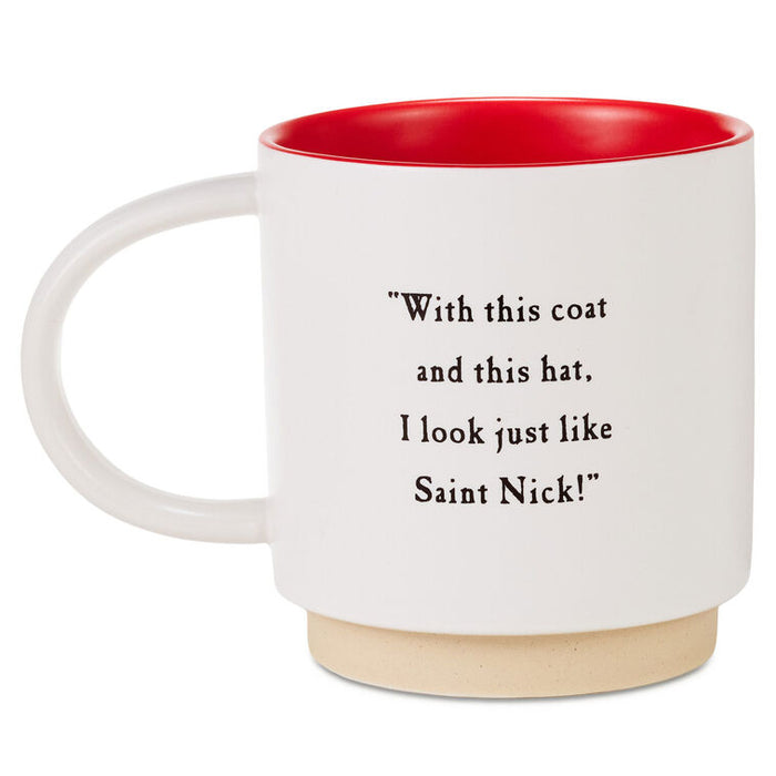 A white ceramic mug with a red interior and a light beige ceramic base, featuring the black printed text: 'With this coat and this hat, I look just like Saint Nick!'.