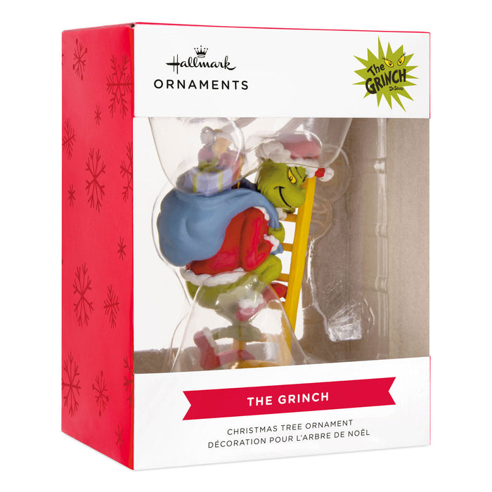 Hallmark The Grinch Christmas ornament packaging with red and white design.