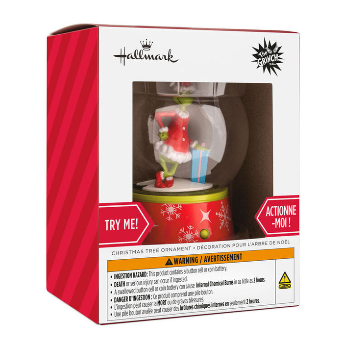 Hallmark Christmas Tree Ornament 'Snatch' novelty ornament in its original retail packaging, featuring a red and white box with a clear window showing the ornament inside.