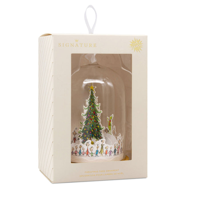Decorative Christmas tree ornament in a box with 'Signature' branding.