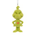 A green Grinch plush ornament with yellow eyes, a red heart on the chest, and a white hanging loop at the top, shown against a plain white background.