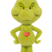 Green plush toy with a red heart on a white background