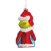 Christmas ornament of a character in a red outfit with white accents on a white background