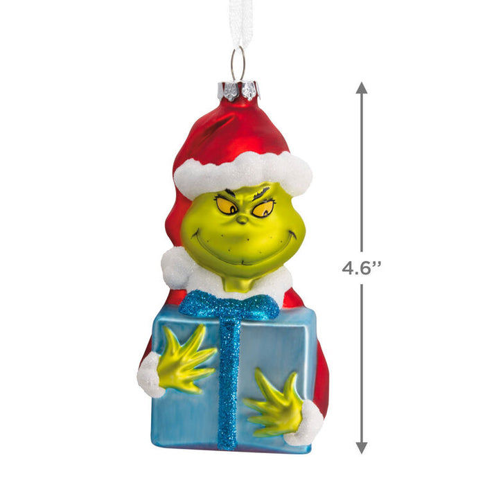 Grinch Christmas ornament holding a blue gift box, shown with a vertical measurement arrow and text indicating 4.6 inches.
