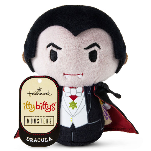 Hallmark Itty Bittys Monsters Dracula plush toy with its original hangtag, featuring a black hair, white face, and black and red costume on a white background.