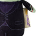 Close-up of a plush toy wearing a dark purple vest, with a beige fabric tag on the side that reads 'Bugs' in purple and yellow.