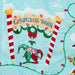 A close-up of a light blue fabric featuring a festive Christmas Town design. The print includes a large banner reading 'CHRISTMAS TOWN' under a snowy archway, decorated with red-and-white striped poles, green holly garlands, colorful Christmas lights, and two kissing elves at the bottom.