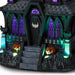 A spooky haunted house Halloween decoration with glowing purple windows, a bat emblem on the door, steps, and two lit jack-o'-lanterns on the front.