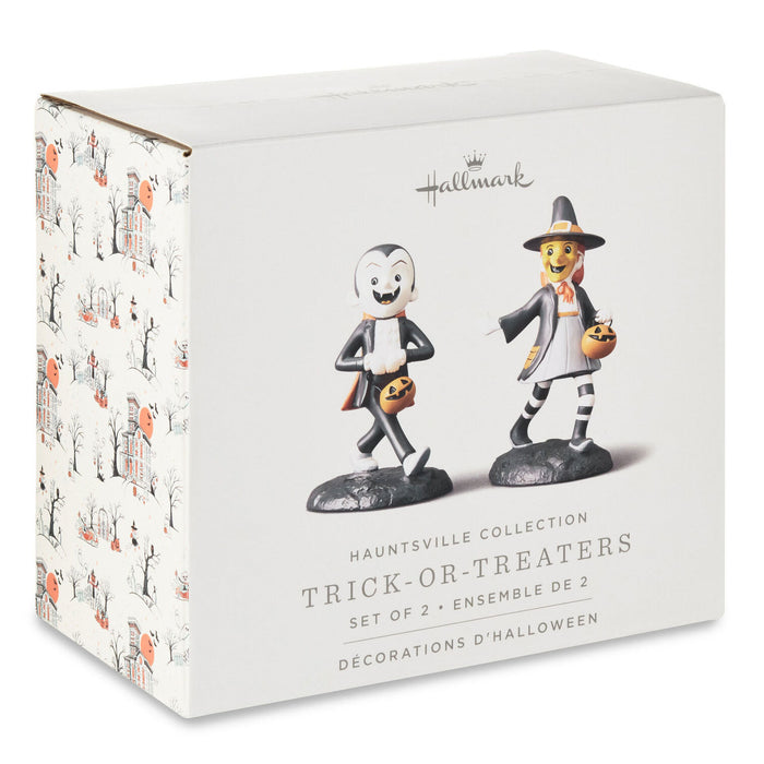 Hallmark Hauntsville Collection Trick-or-Treaters set of 2 decorative figurines in their original white patterned retail box.