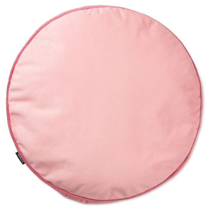 A round pink cushion or floor pad with a slightly darker pink stitched border, shown on a plain white background.
