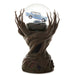 A decorative tree-bark style display base holding a clear glass globe with a small blue car inside, photographed on a plain white background.
