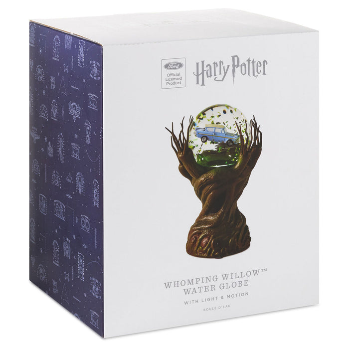 Harry Potter Whomping Willow Water Globe collectible box, featuring a white front with the product illustration and a dark purple patterned side panel.