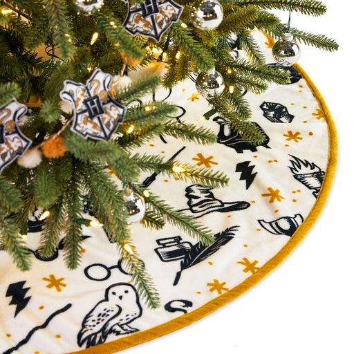 Decorative Christmas tree skirt with festive patterns on a Christmas tree.