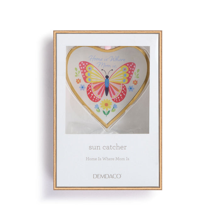 Framed artwork with a butterfly design and text on a white background