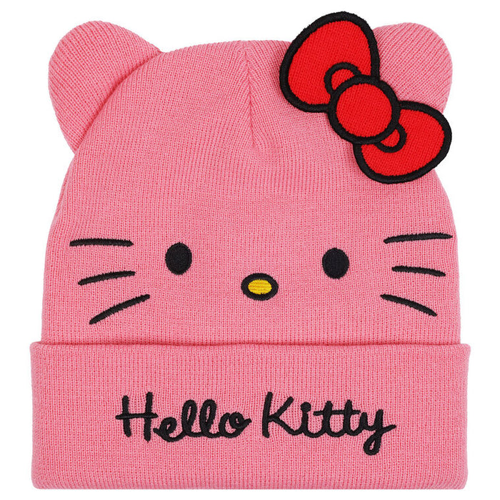 Pink beanie with Hello Kitty face and red bow on a white background
