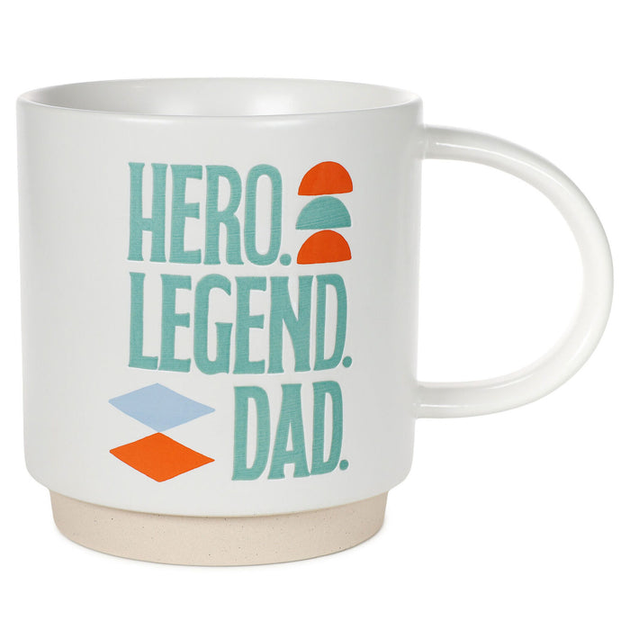White mug with 'HERO. LEGEND. DAD.' text and colorful design on a white background