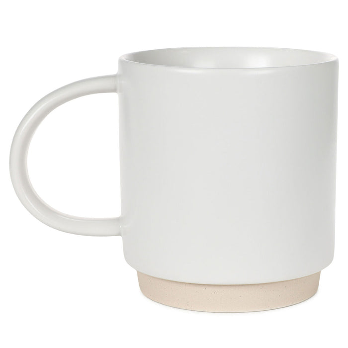 White mug with beige base on a white background