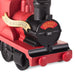 Close-up of a red toy train engine with 'Hogwarts Express' branding on a white background