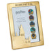 Set of Harry Potter Hogwarts house swap magnets in a gold frame with castle design.