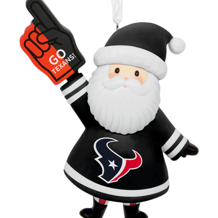 A Texas Houston Texans Christmas ornament shaped like a Santa figure in a black and white uniform, holding a black foam finger with red and white 'GO TEXANS!' text, on a white background.