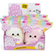 A retail display box of 'The Big Squish' brand jumbo marshmallow squishies, showing two packaged plush squishies: a white marshmallow squishy and a pink marshmallow squishy, with a branded display card behind them.