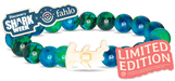 Shark-themed bracelet with Discovery Shark Week and fahlo branding, featuring a limited edition label.