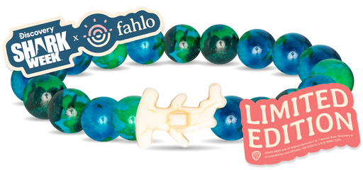 Shark-themed bracelet with Discovery Shark Week and fahlo branding, featuring a limited edition label.
