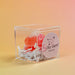 Crystal candy in a clear cube with 'Silky Gem' label on an orange background