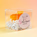 Silky Gem crystal candy in a clear box with a pink label on an orange background