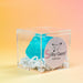 Blue crystal candy in a clear cube with 'Silky Gem' label on a gradient background