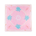 Pink mat with teal lotus pattern on a white background