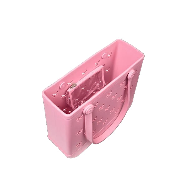 Pink silicone steamer on a white background