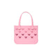 Pink handbag with bow patterns on a white background
