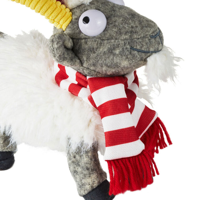 Plush toy with a red and white scarf on a white background