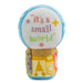 Toy snow globe with 'it's a small world' text on a white background