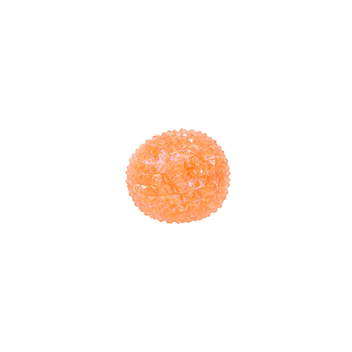 An orange textured spherical ball with a faceted, diamond-patterned surface, centered on a solid white background.