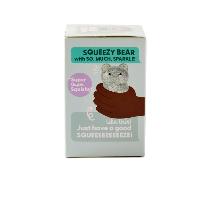 A boxed product labeled 'SQUEEZY BEAR with SO. MUCH.