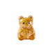 Gold glittery bear-shaped object on a white background