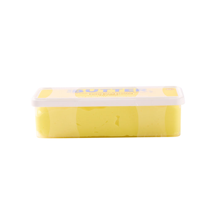 A rectangular plastic tub of yellow butter with a white lid, shown on a plain white background.