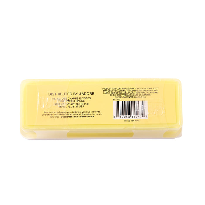 A yellow rectangular plastic case viewed from the back, sealed in clear plastic wrap. The case has black printed text including 'DISTRIBUTED BY J'ADORE' and a barcode, on a plain white background.